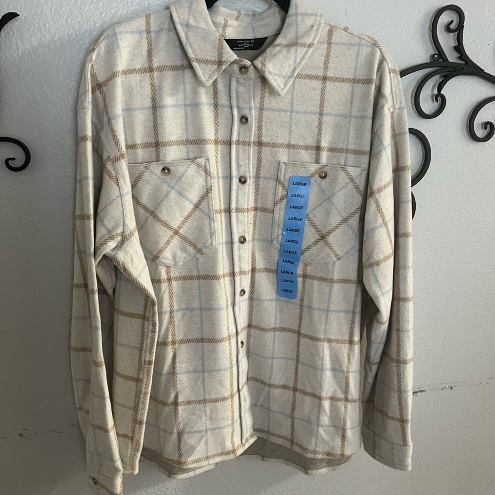 Woman Plaid Button-Up Long Sleeve Shirt in Cream and Tan.